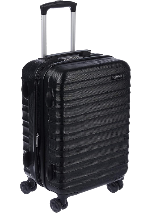 Amazon Basics Hardside hard suitcase in black.